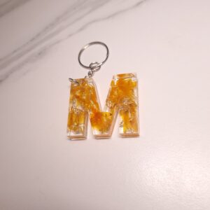 Breloczek literka nagietek & złoto